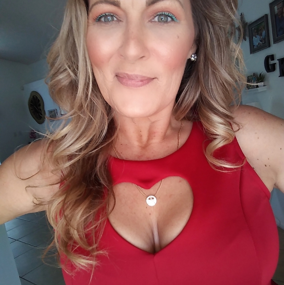 Woman's red peek a boo heart top
